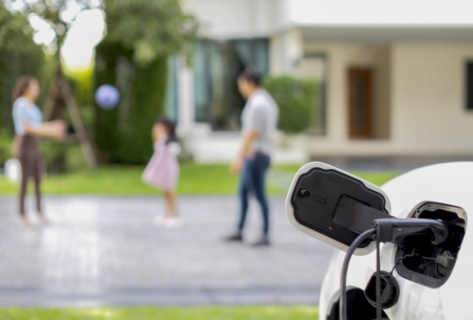 focus-ev-charger-recharge-ev-car-home-with-progressive-family-background